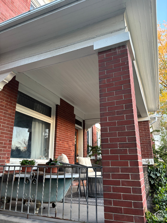 Doorway to property featuring a porch