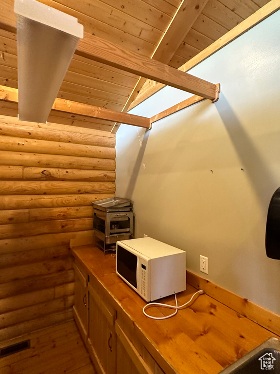 Interior space featuring hardwood / wood-style flooring and wood ceiling