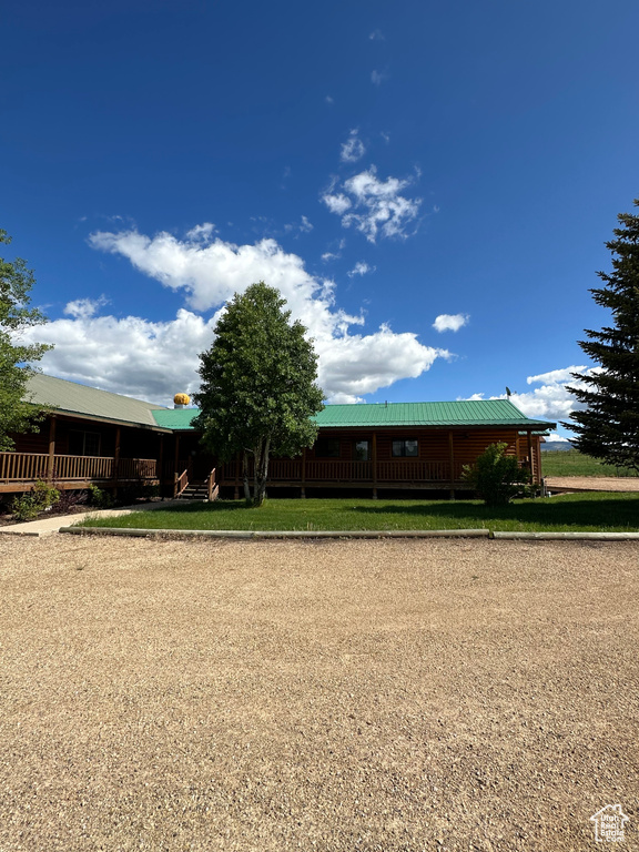 Exterior space with a front yard