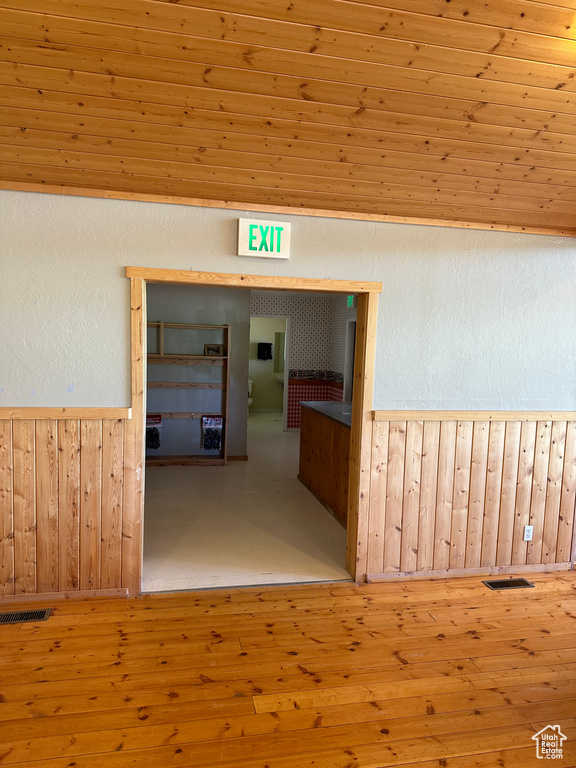 Hall featuring wood ceiling