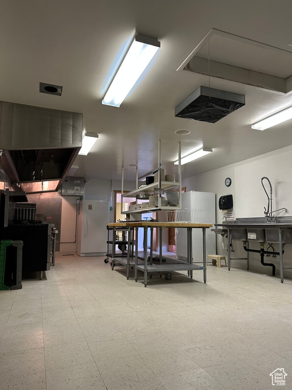 Miscellaneous room featuring tile flooring