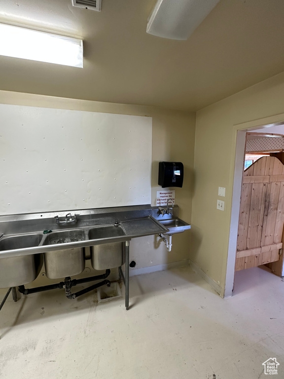 Interior space featuring concrete floors