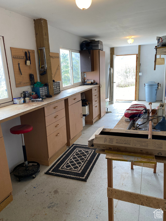 Kitchen featuring light brown cabinetry