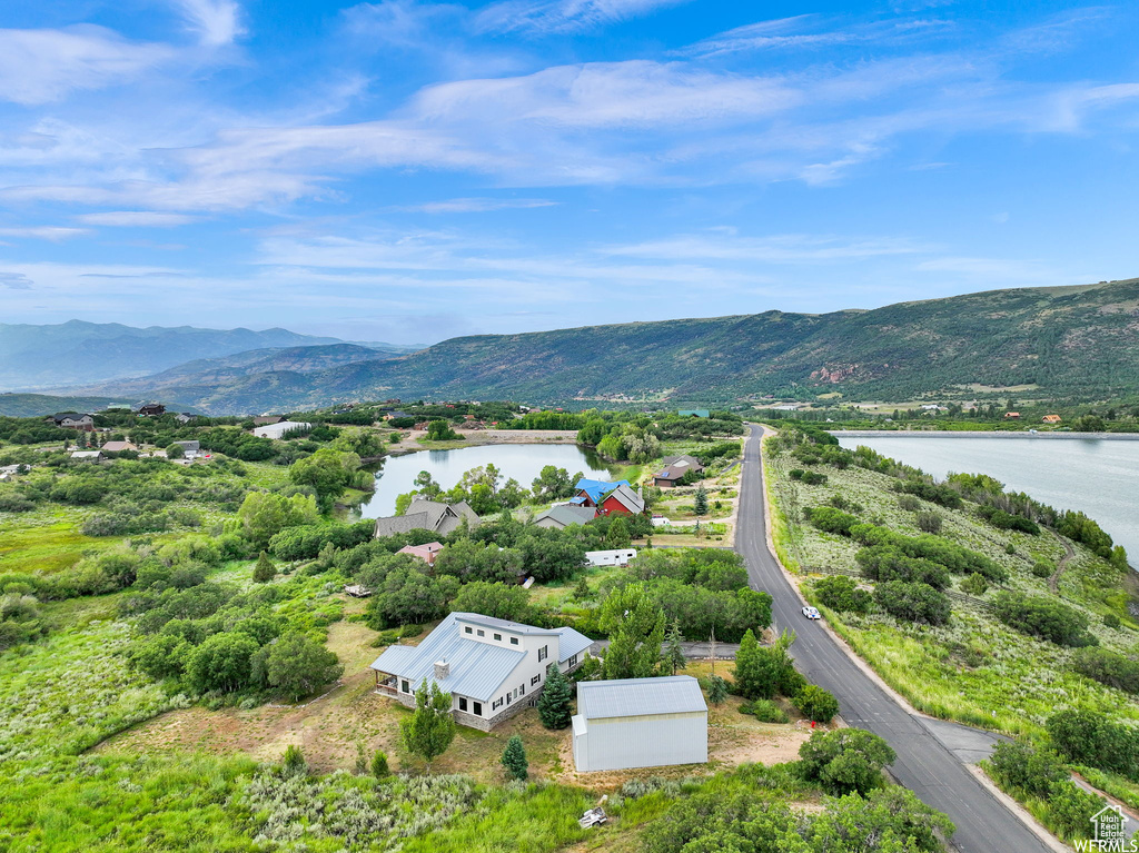 Aerial view with a water and mountain view