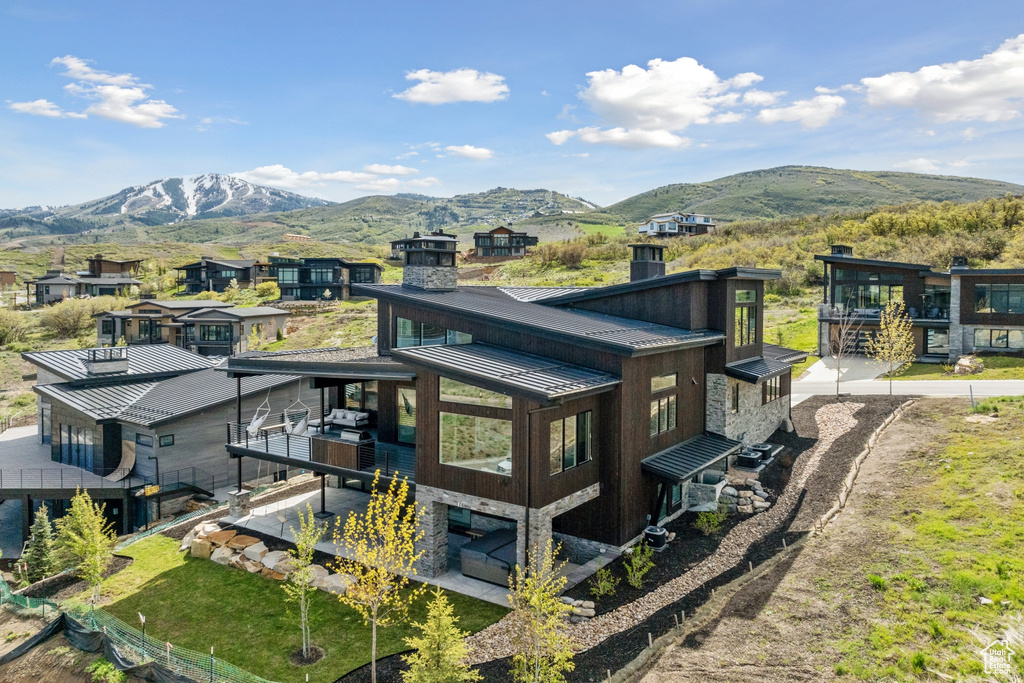 Exterior space featuring a mountain view