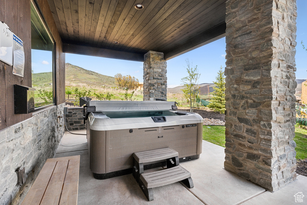 View of patio featuring a mountain view