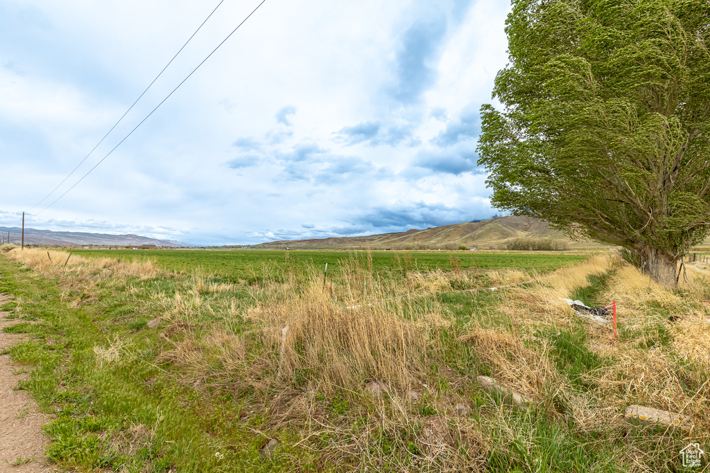 Exterior space with a rural view and a mountain view