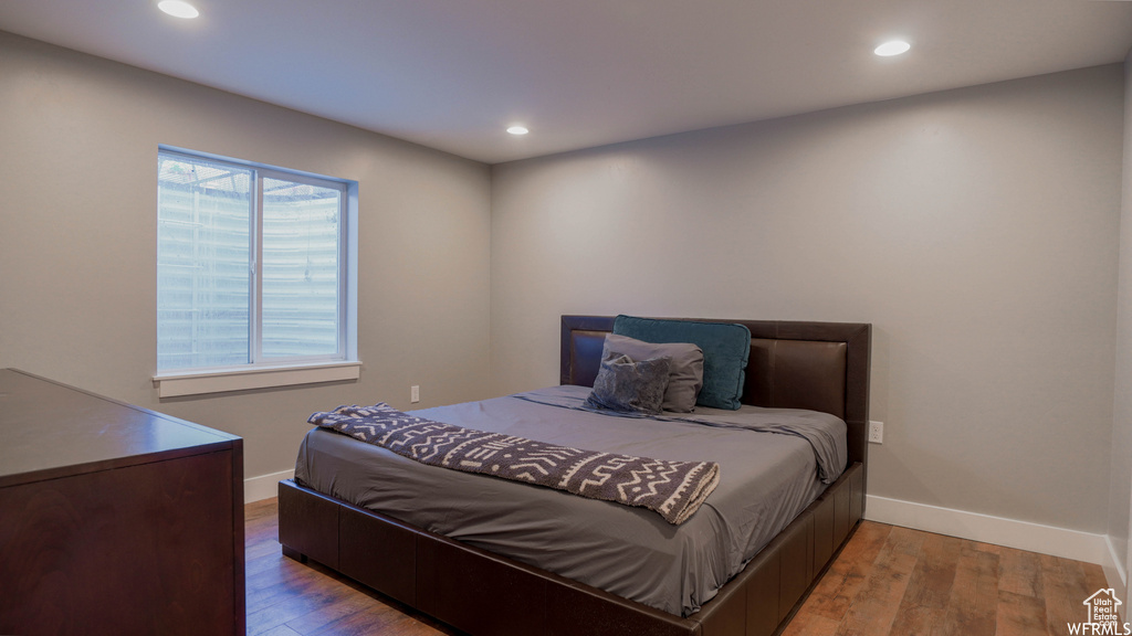 Bedroom featuring hardwood / wood-style flooring