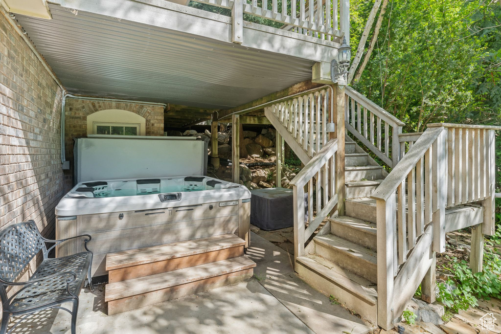 Deck featuring a hot tub