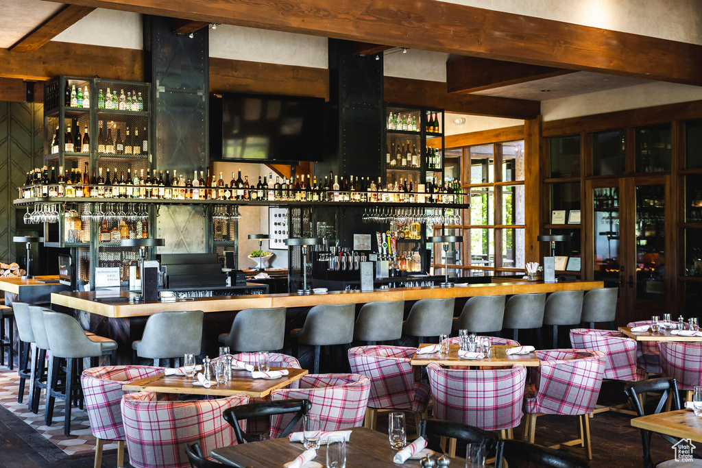 Bar featuring beam ceiling