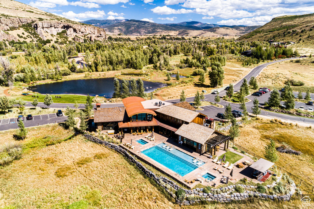 Bird's eye view featuring a water and mountain view