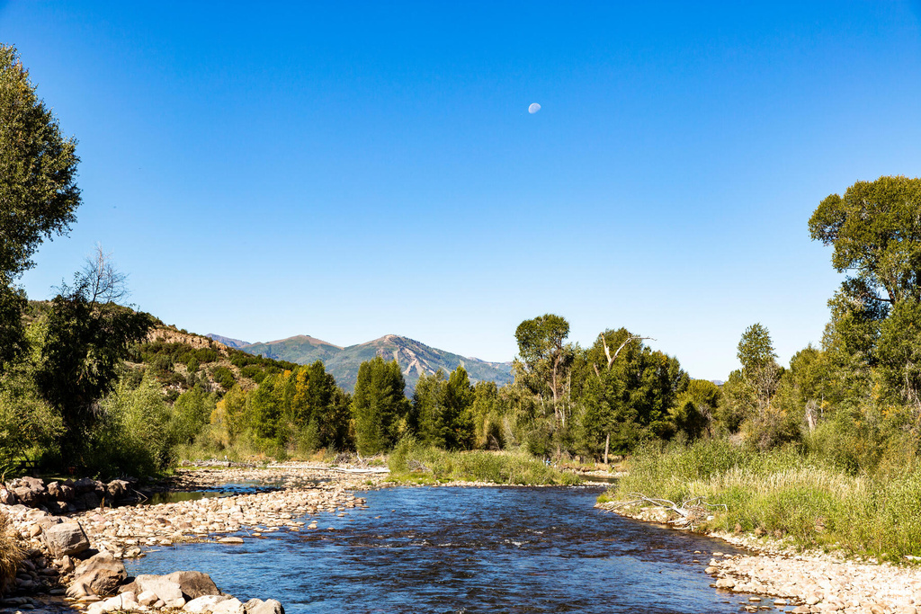 View of water feature with a mountain view