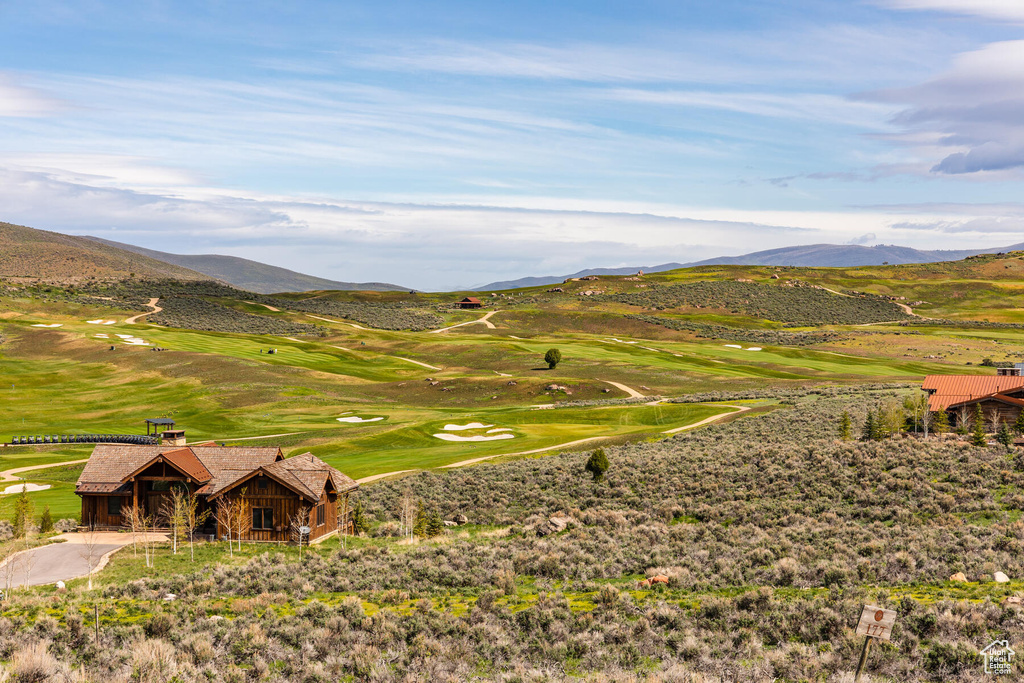 Property view of mountains with a rural view