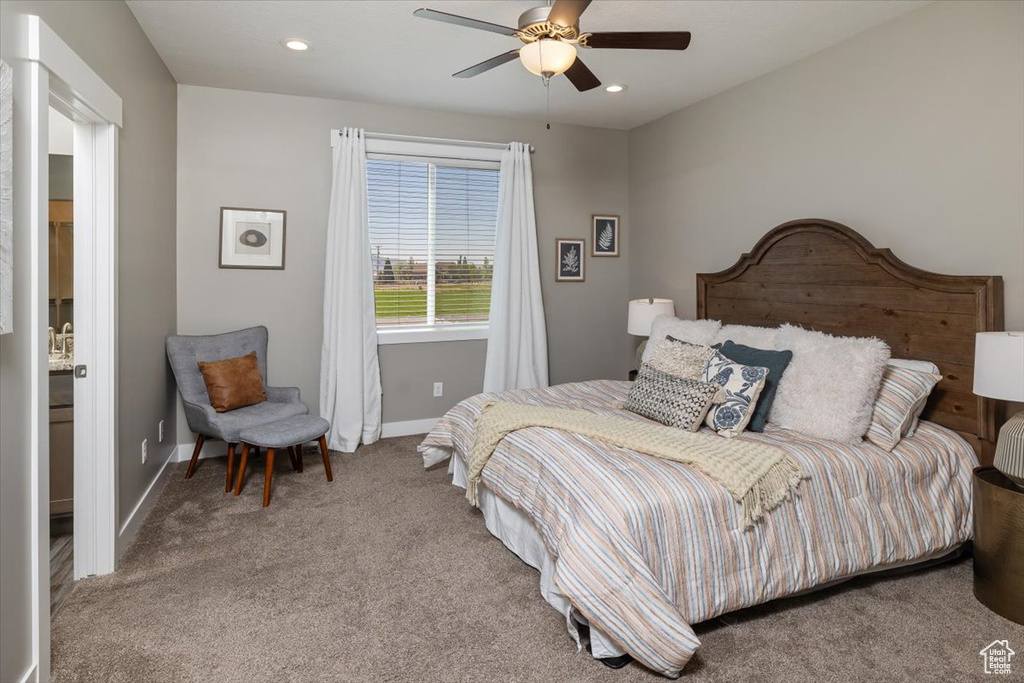 Bedroom featuring carpet flooring and ceiling fan