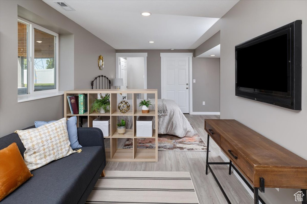 Living room featuring hardwood / wood-style flooring