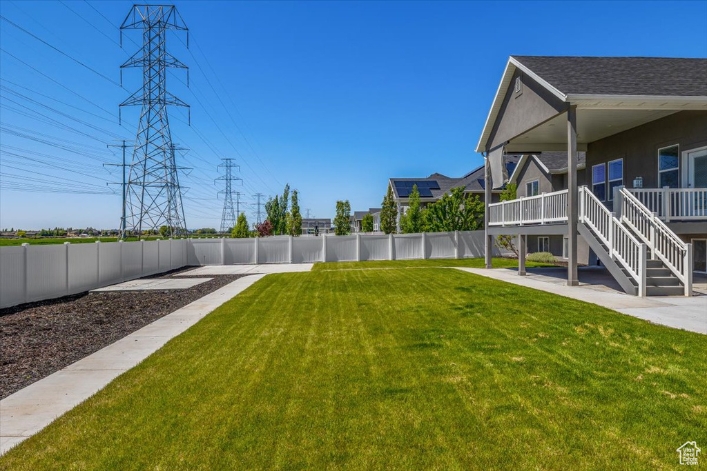 View of yard with a patio