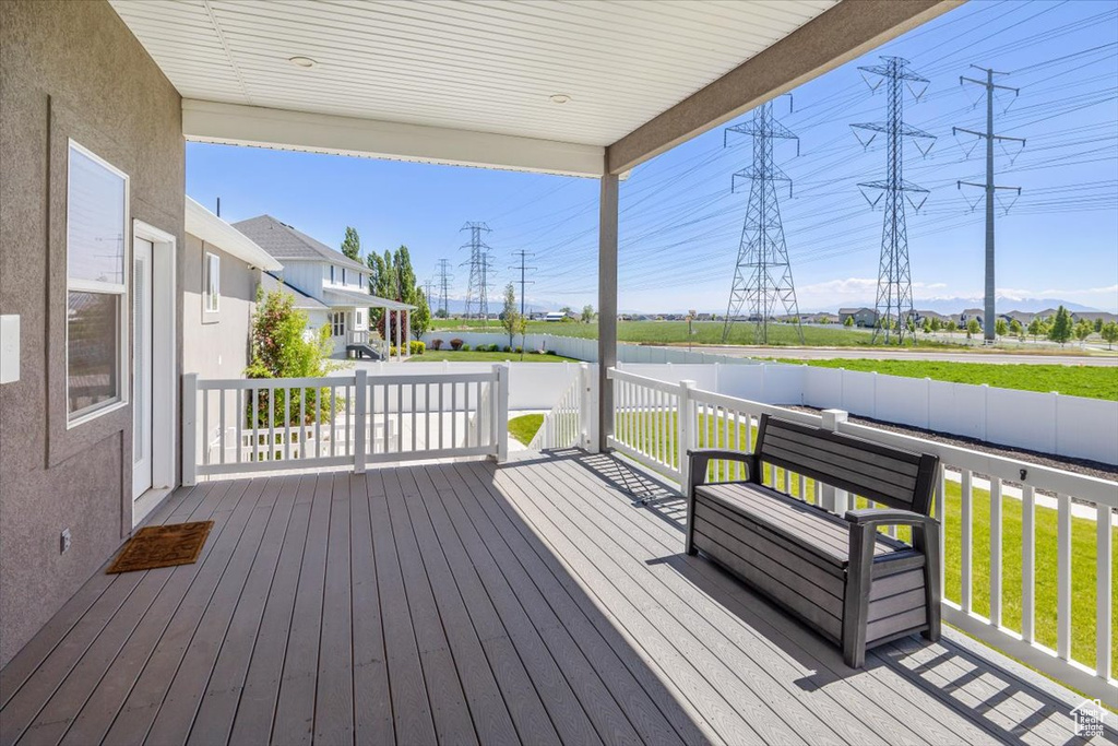 Wooden terrace with a lawn