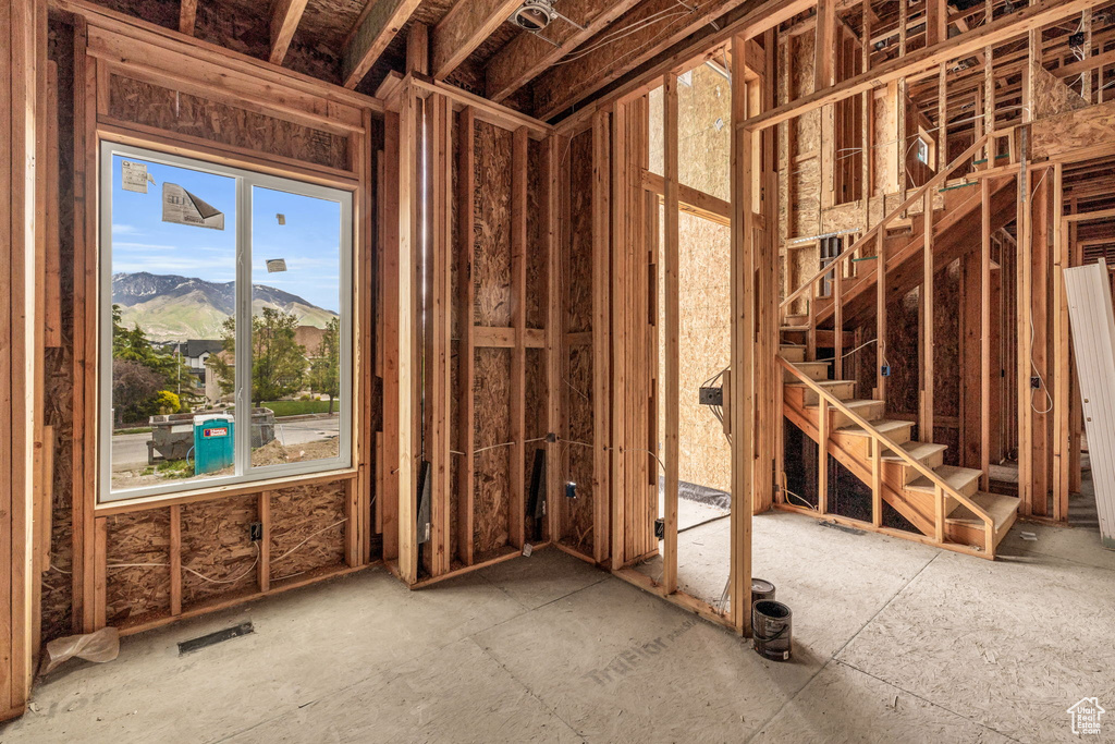 Misc room featuring a mountain view and a wealth of natural light