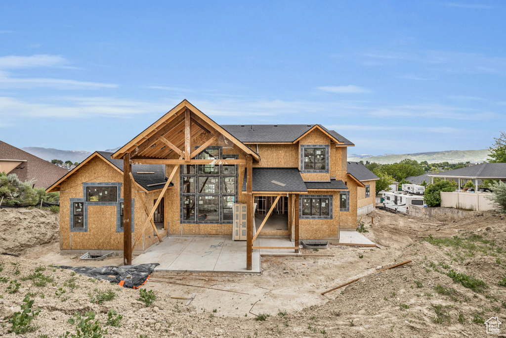 Rear view of house with a patio