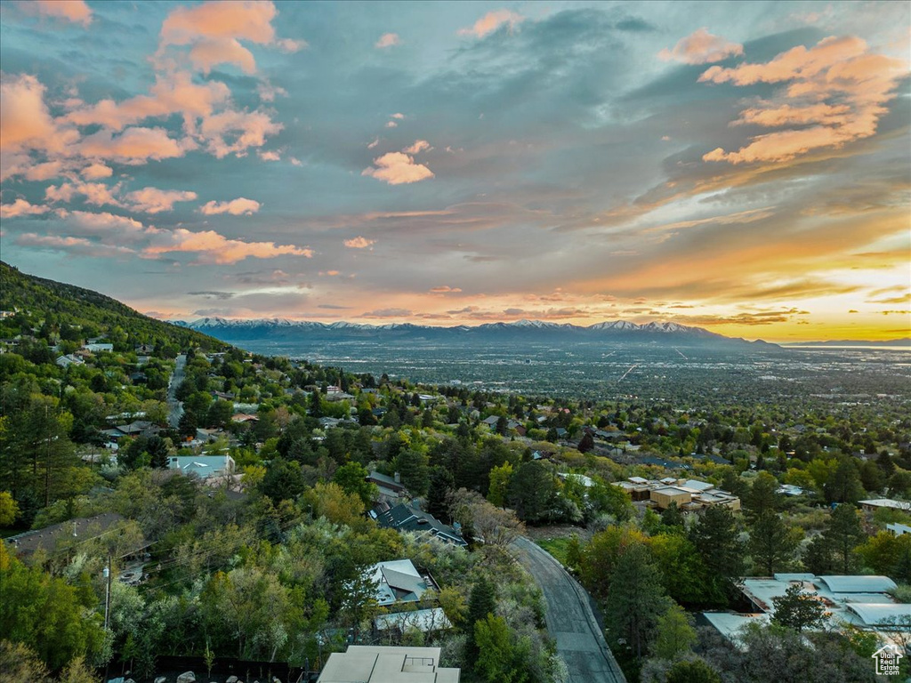 Aerial view at dusk featuring a mountain view