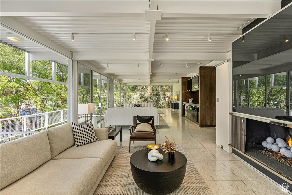 Sunroom / solarium featuring rail lighting