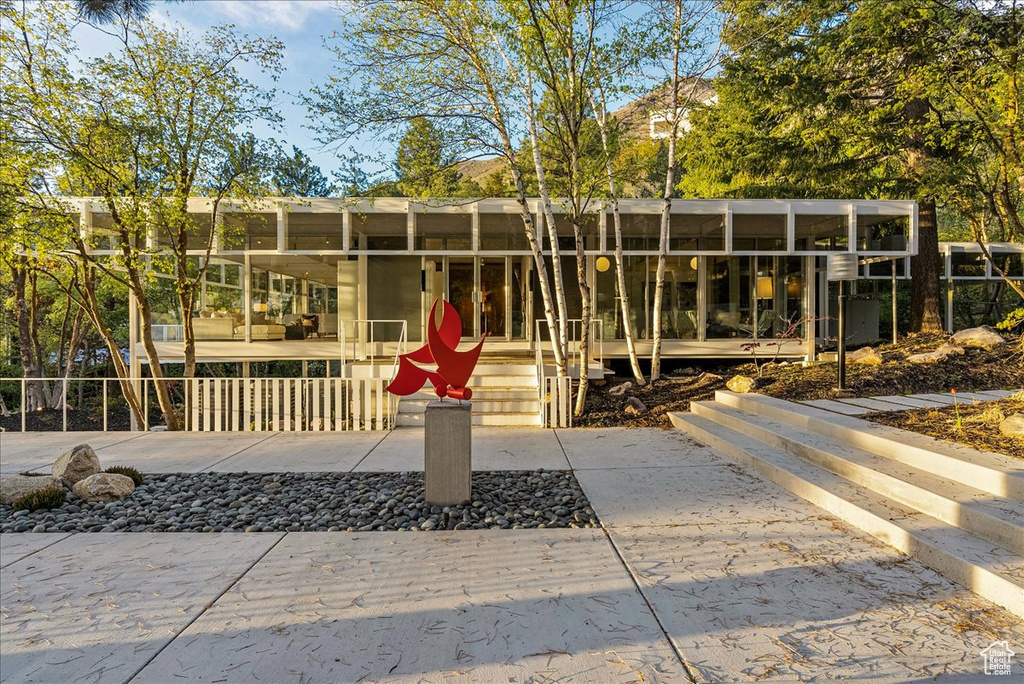 View of front of property with a patio area