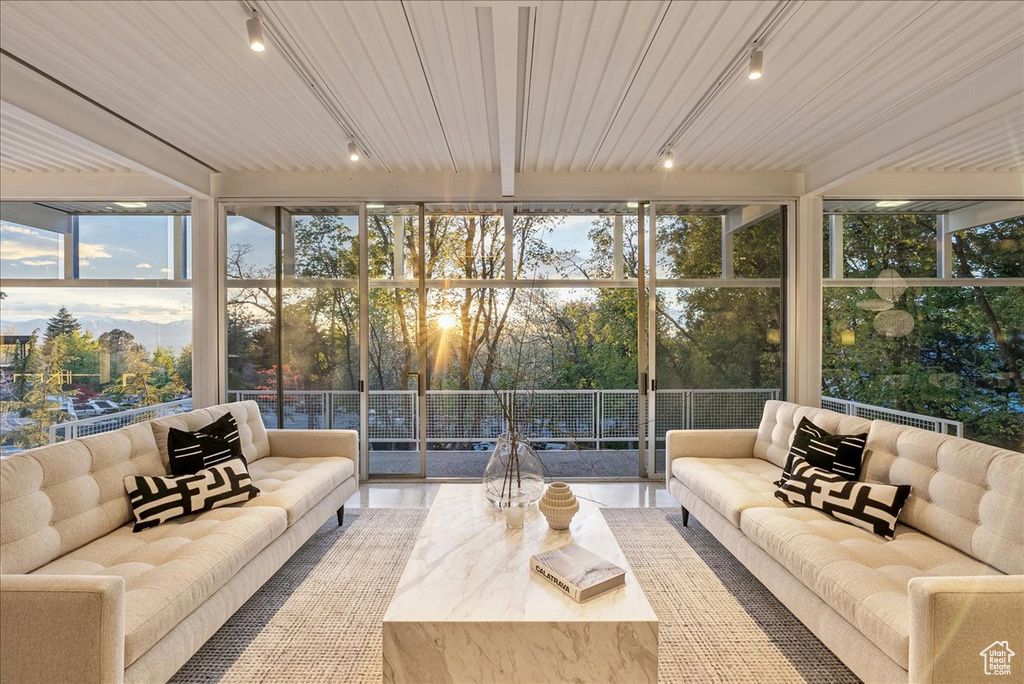 Sunroom / solarium featuring track lighting