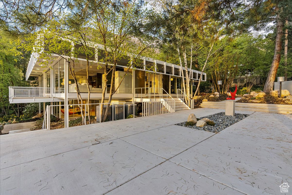 Rear view of property with a patio