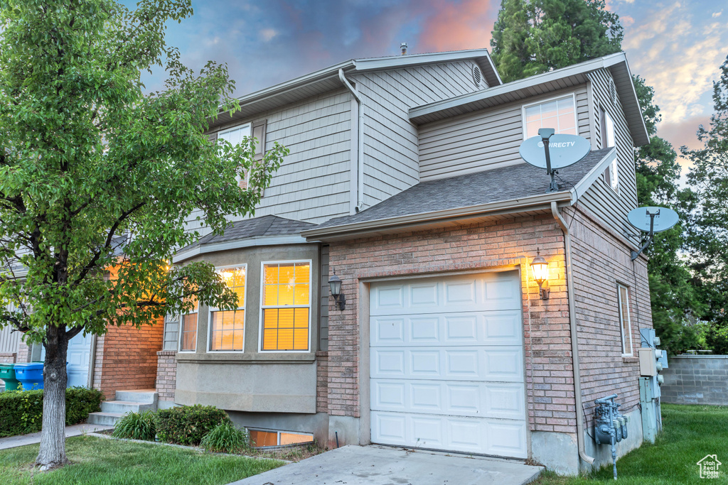 View of front of house featuring a garage