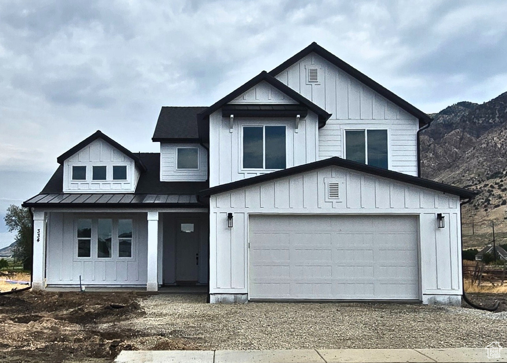 Modern inspired farmhouse with a garage