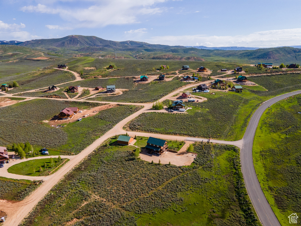 Birds eye view of property featuring a rural view and a mountain view