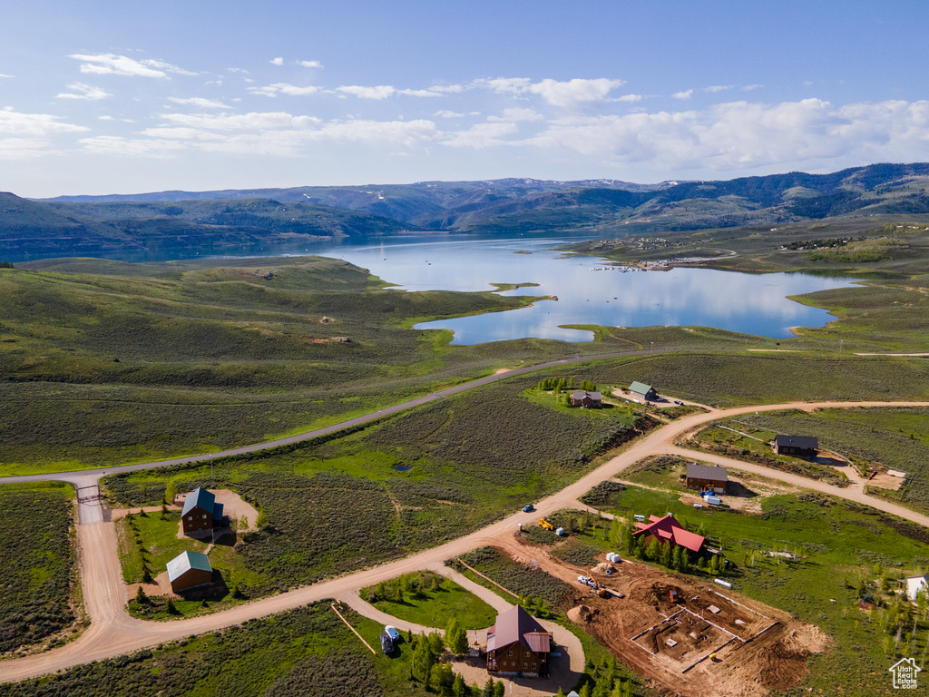 Bird's eye view featuring a water and mountain view