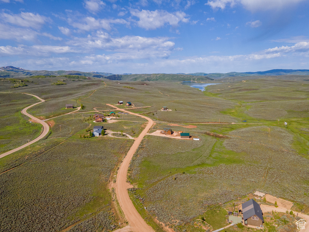 Birds eye view of property with a rural view