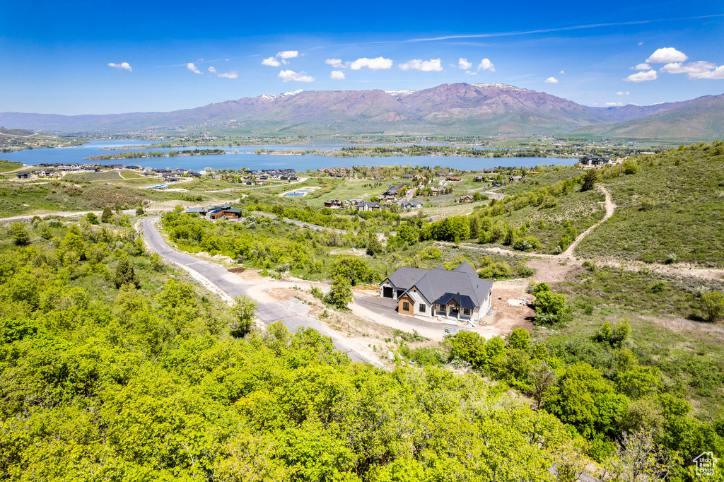 Aerial view with a water and mountain view