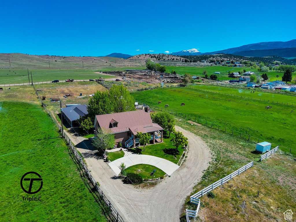 Drone / aerial view featuring a mountain view and a rural view