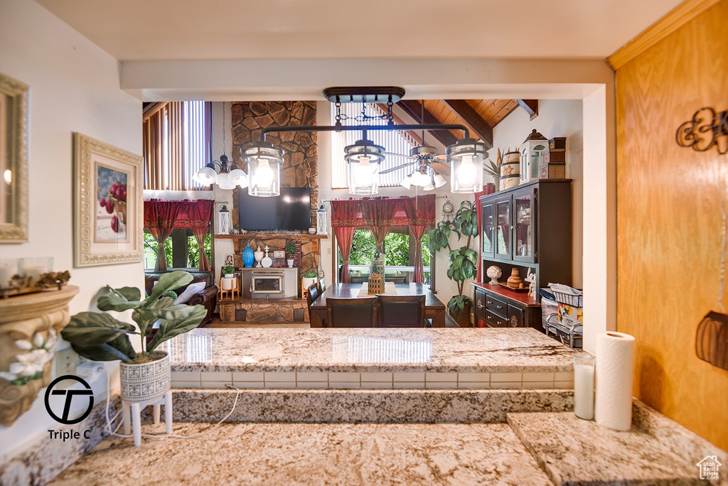 Kitchen featuring beam ceiling