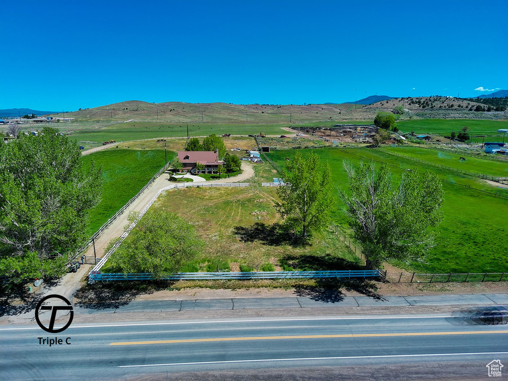 Birds eye view of property featuring a mountain view