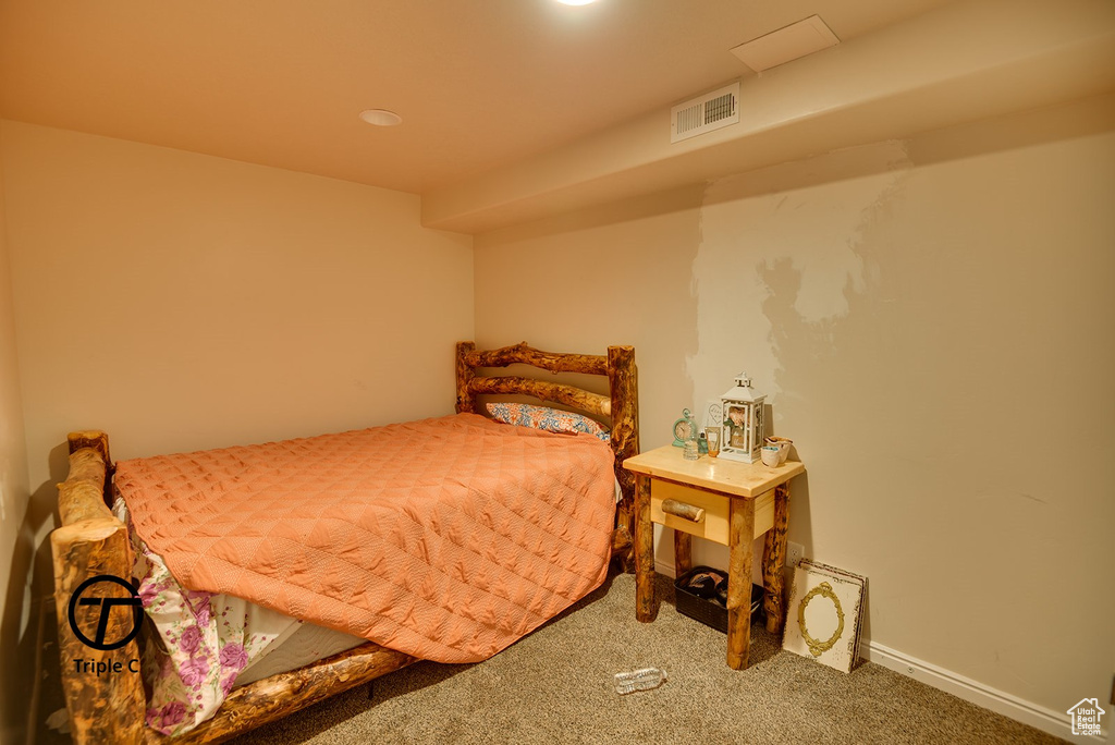 Bedroom with carpet flooring