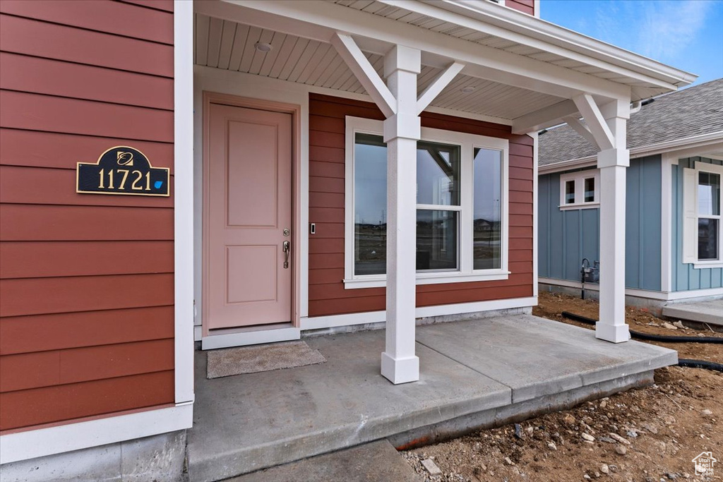 Entrance to property with a porch