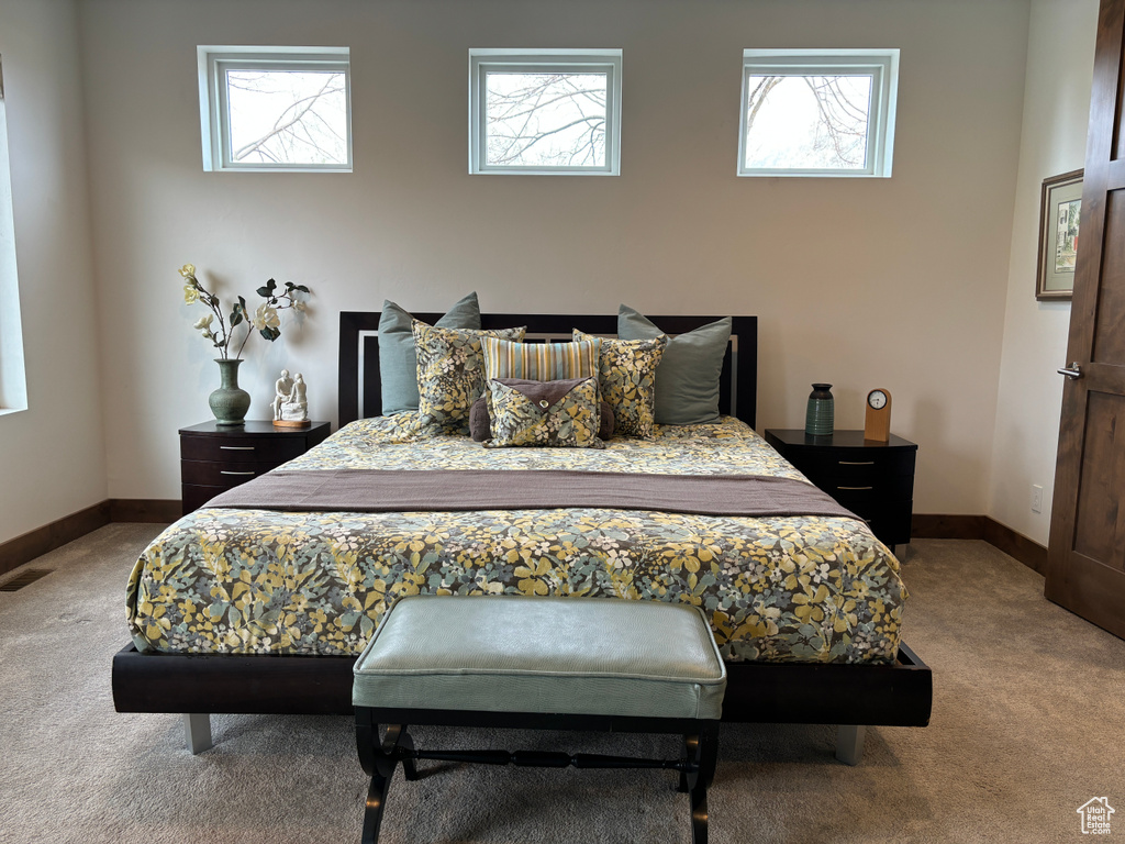 Bedroom featuring carpet floors