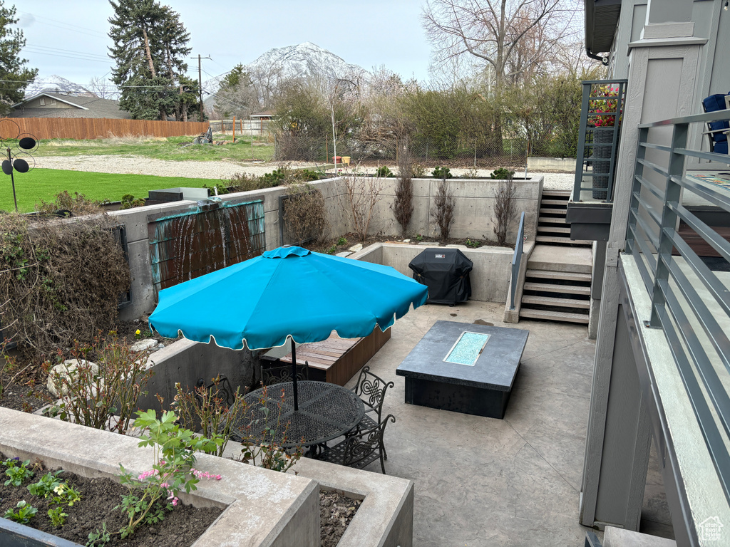 View of patio with a mountain view