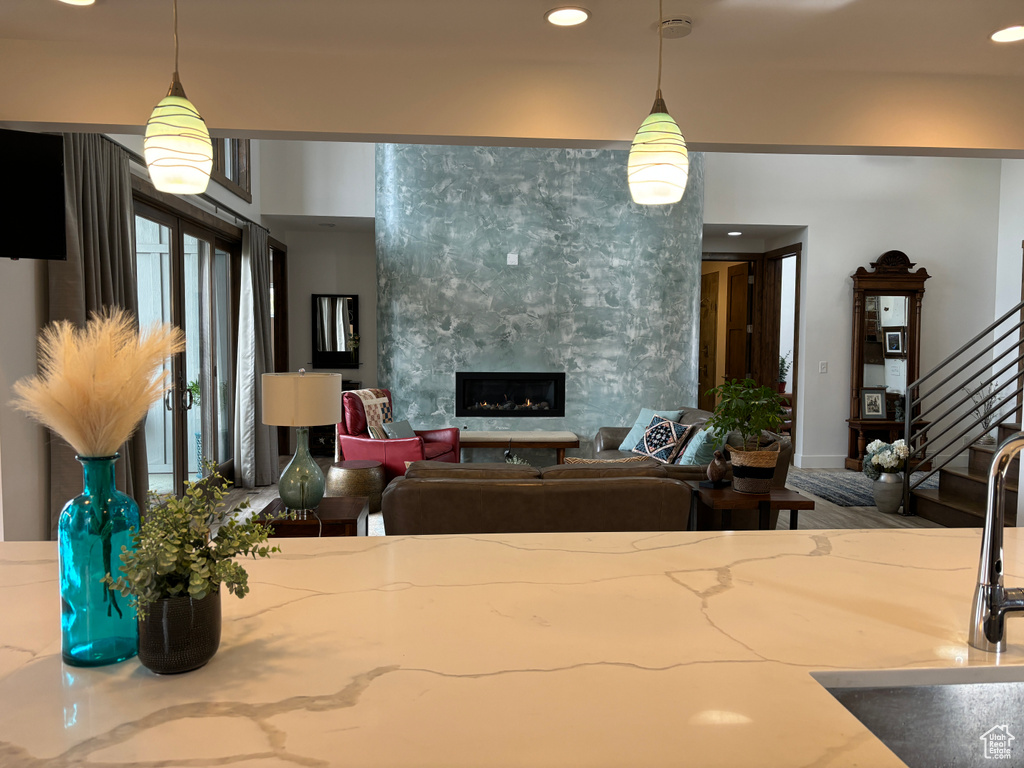 Living room with sink and a fireplace