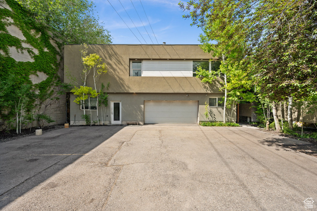 View of front of home featuring a garage