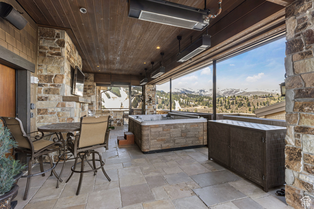 View of terrace featuring area for grilling