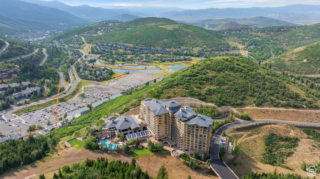 Aerial view featuring a water and mountain view