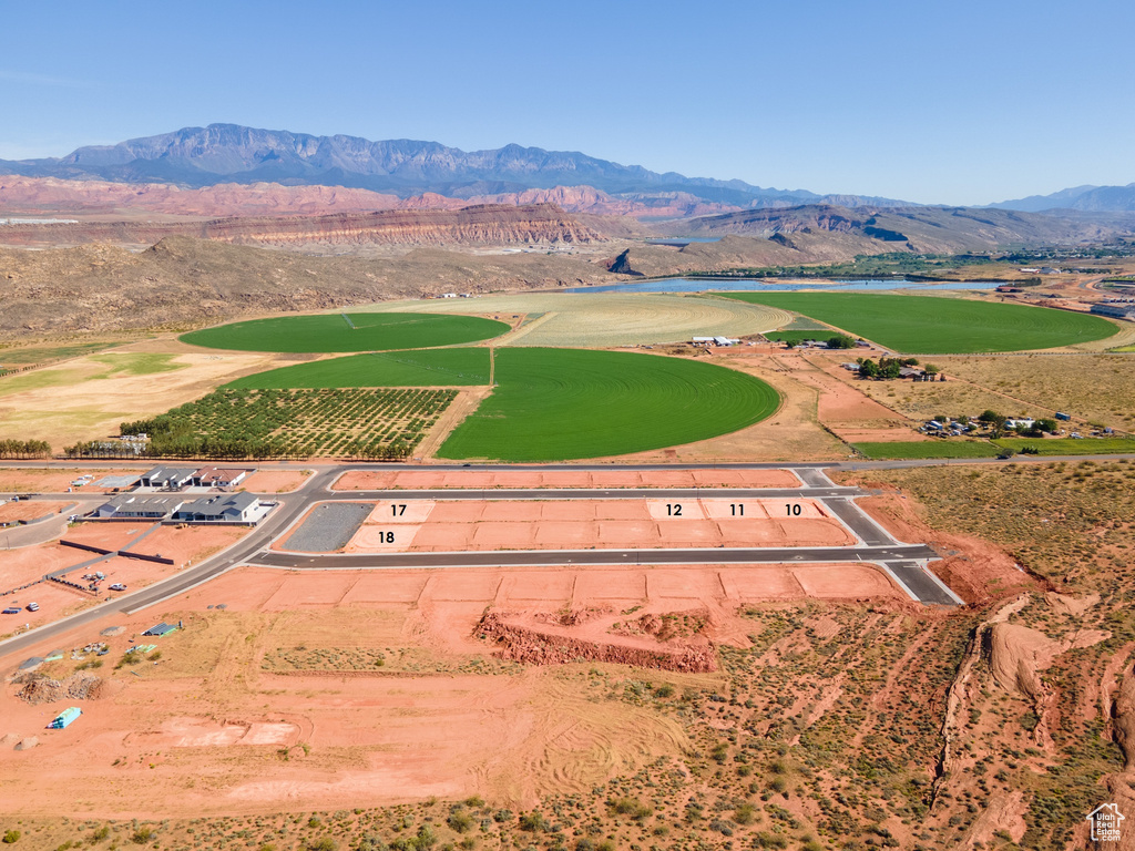 Birds eye view of property with a mountain view