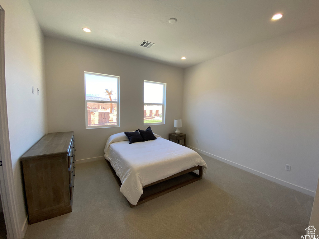 View of carpeted bedroom