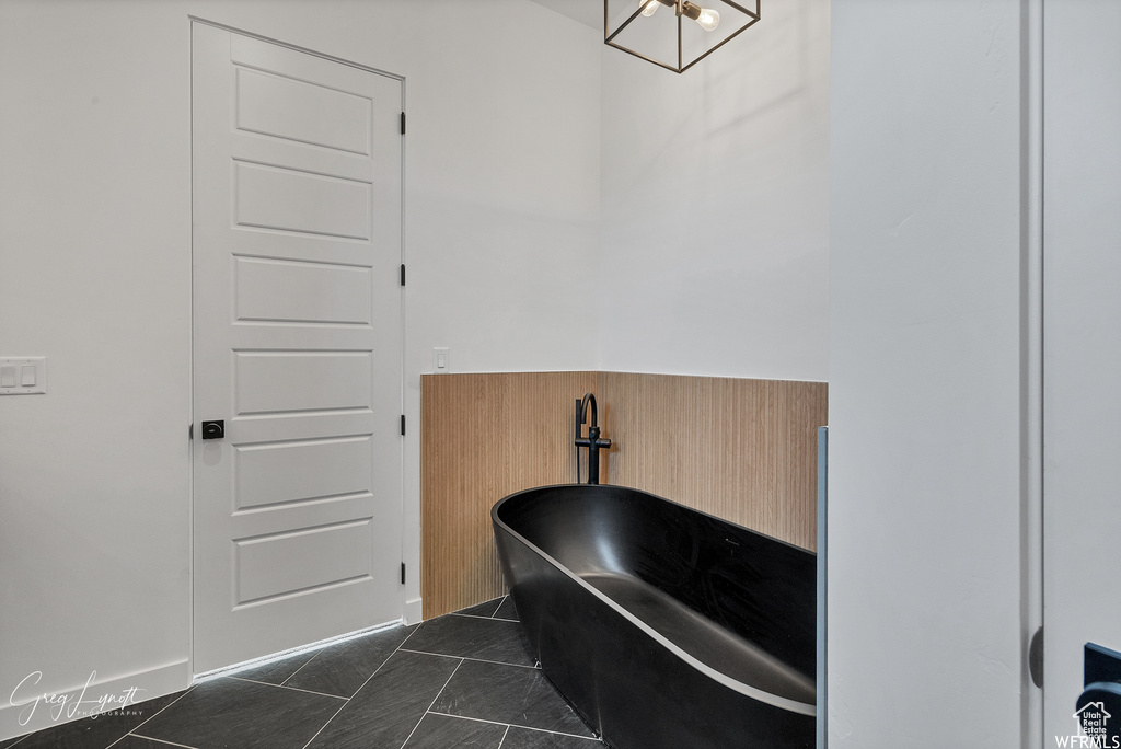 Bathroom with tile flooring