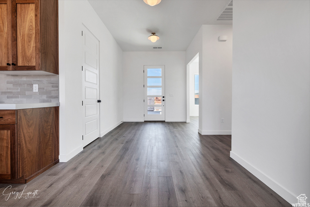 Interior space with hardwood / wood-style flooring