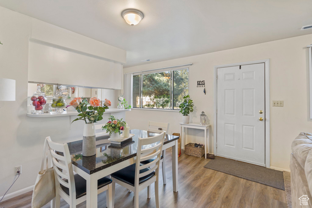 Dining area featuring light wood-type flooring